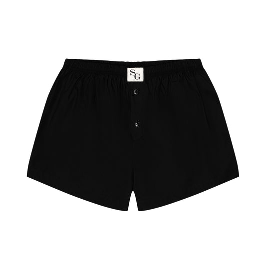 Black high rise boxers with embroidered SG logo flat lay front view